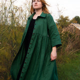 The Hybrid Dress in soft green linen