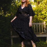 The Joan Dress in Black Polka