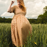 The Double Take Dress in Red Polka Cotton