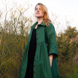 The Hybrid Dress in soft green linen