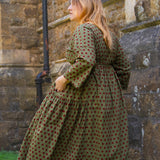 The Double Take Dress in Red Polka on Green Cotton