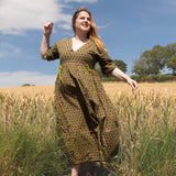 The Double Take Dress in Red Polka on Green Cotton