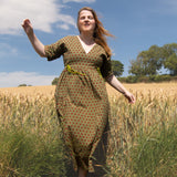 The Double Take Dress in Red Polka on Green Cotton