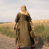 The Double Take Dress in Red Polka on Green Cotton
