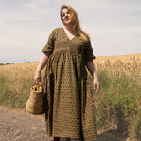 The Double Take Dress in Red Polka on Green Cotton