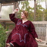 The Double Take Dress in Berry Linen with ribbon appliquè