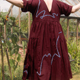 The Double Take Dress in Berry Linen with ribbon appliquè