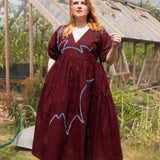 The Double Take Dress in Berry Linen with ribbon appliquè