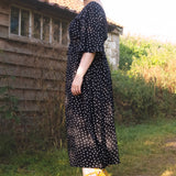 The Joan Dress in Black Polka