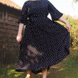 The Joan Dress in Black Polka